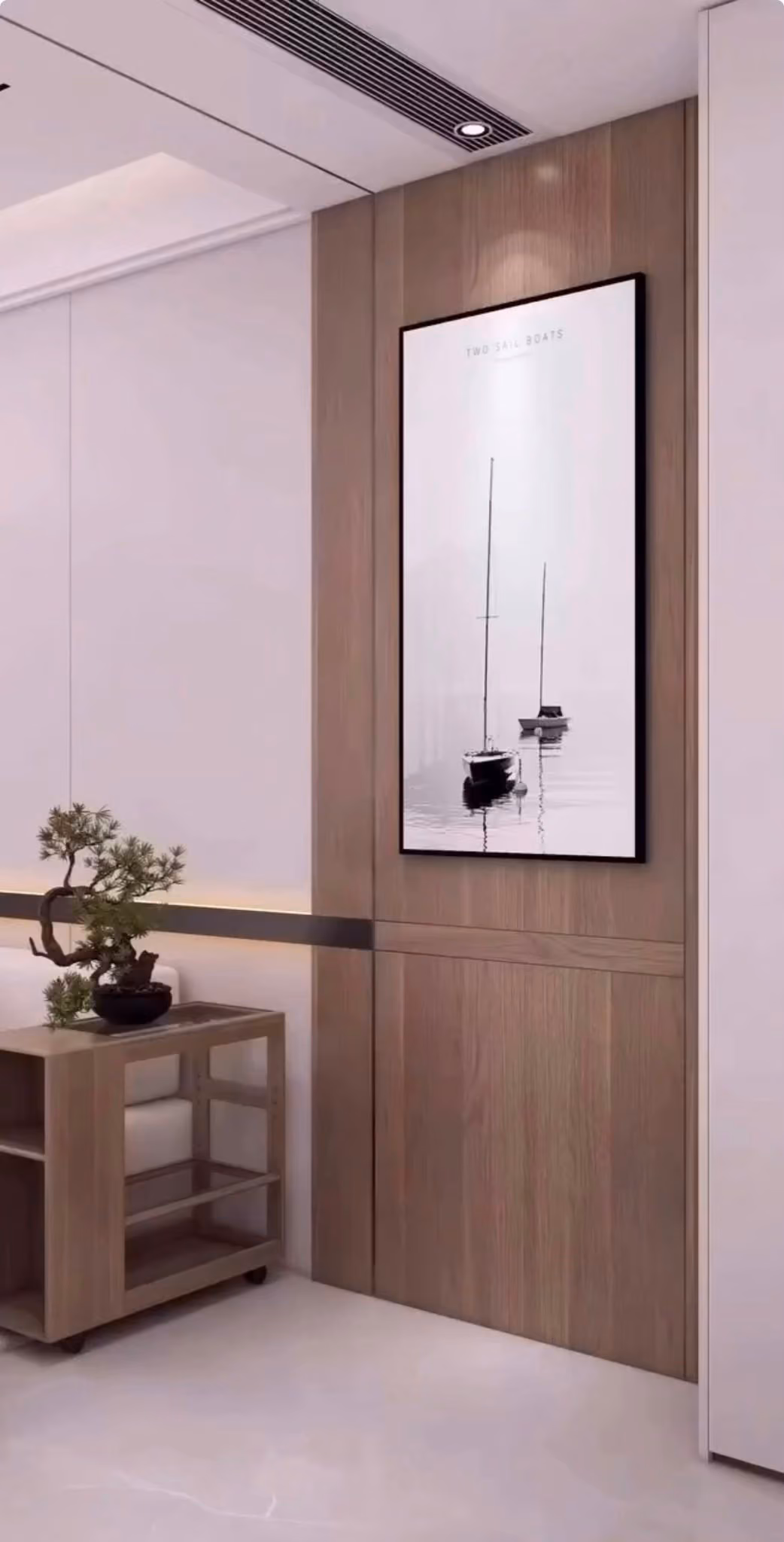 Salón con panel de madera y sofás en blanco